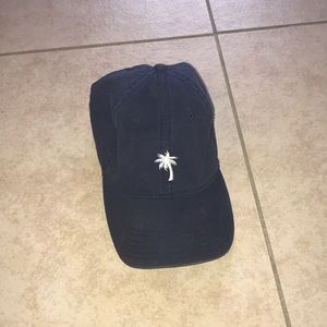 Dark blue hat with white palm tree